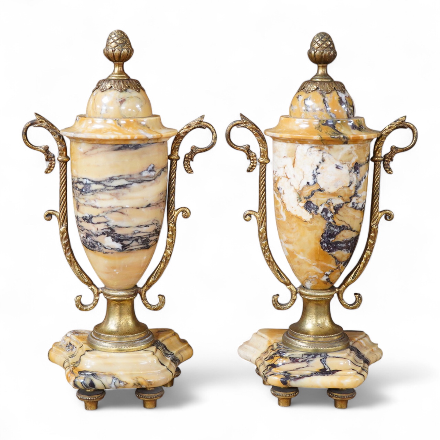 A pair of late 19th century French Sienna marble and ormolu mounted urns, 31cm high.